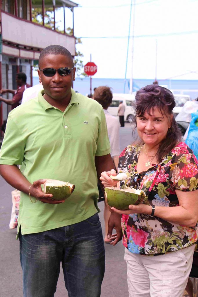Island Time SLU Enjoying Coconuts in Soufriere