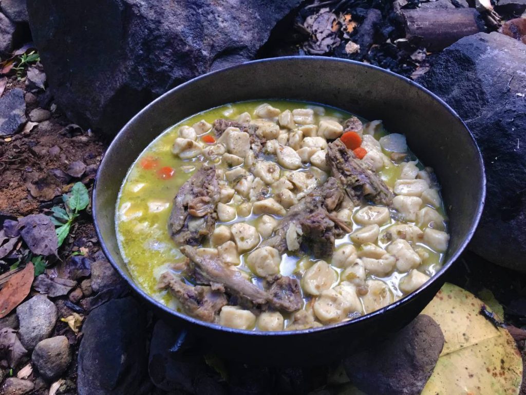 Local St. Lucian meal cooked at waterfall after hike